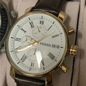 Gold and white fossil watch with dark brown band